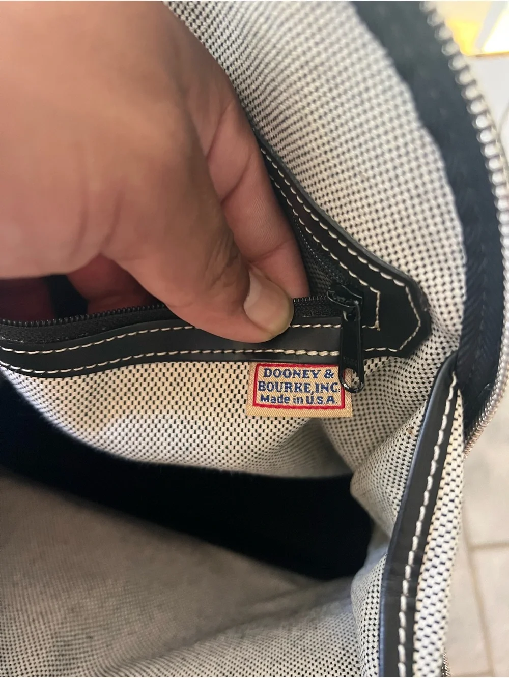Dooney & Bourke structured dome